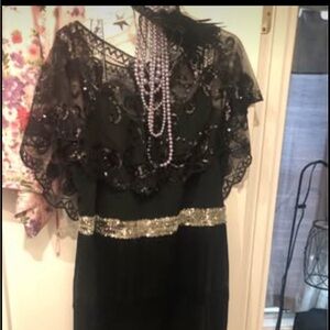 Elegant Black Dress with Gold Accents